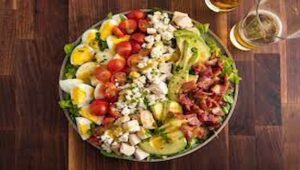 What distinguishes a Cobb salad?